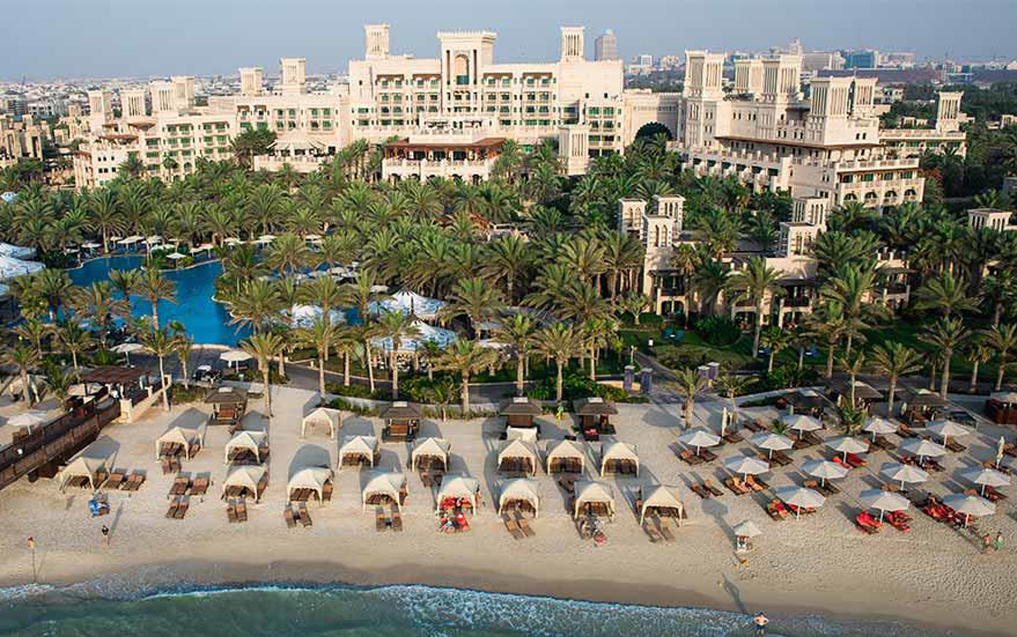 Jumeirah Al Qasr Hotel Dubai exterior view with beach resort setting